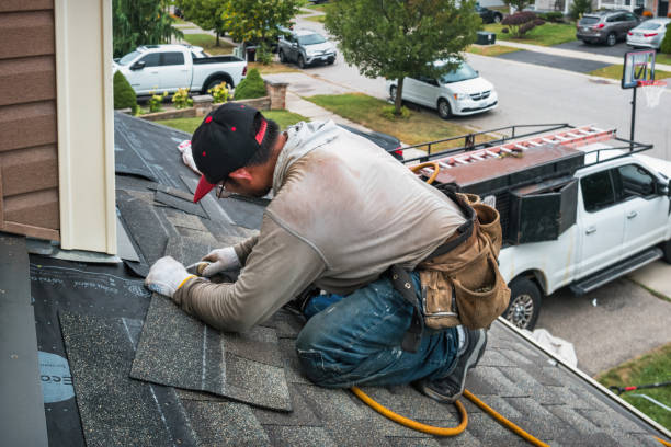 Professional Roof Replacement technician working in Harpster, OH